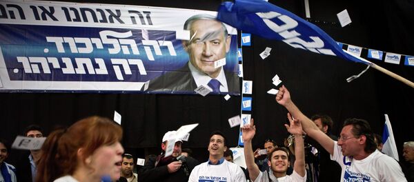 Likud party supporters react after hearing exit poll results in Tel Aviv March 17, 2015. - Sputnik Mundo