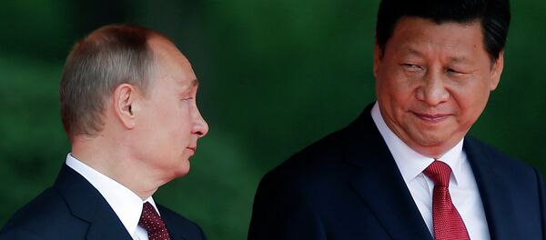 Vladímir Putin, presidente de Rusia, y Xi Jinping, presidente de China (Archivo) - Sputnik Mundo