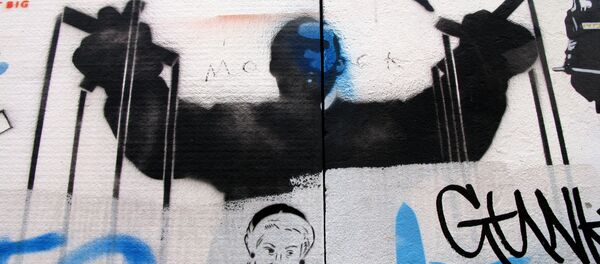 Un grafiti de titiritero - Sputnik Mundo