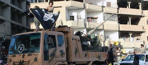 Militantes del grupo yihadista Estado Islámico - Sputnik Mundo