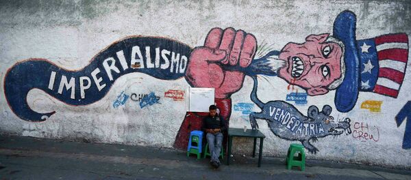 Un grafiti antiamericano en Caracas - Sputnik Mundo