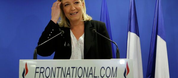 National Front leader Marine Le Pen attends a news conference after the first round of French local elections in Nanterre, near Paris, March 22, 2015. - Sputnik Mundo