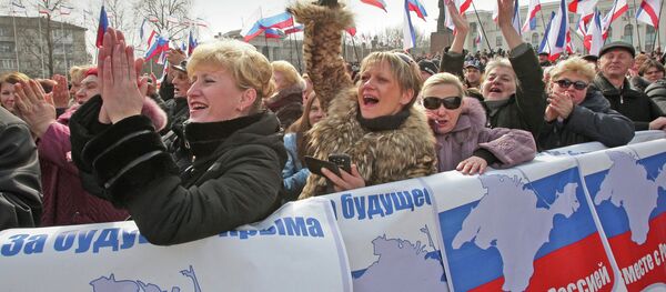 La celebración del aniversario de la adhesión de Crimea a Rusia en Simferópol (archivo) La celebración del aniversario de la adhesión de Crimea a Rusia en Simferópol (archivo) - Sputnik Mundo