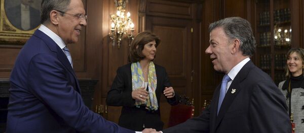Serguéi Lavrov, ministro de Exteriores de Rusia, y Juan Manuel Santos, presidente de Colombia - Sputnik Mundo