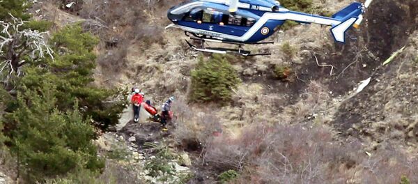 A French gendarme helicopter flies over the crash site of an Airbus A320, near Seyne-les-Alpes, March 25, 2015. - Sputnik Mundo