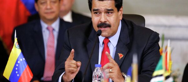 Venezuela's President Nicolas Maduro speaks during an ALBA alliance summit in Caracas March 17, 2015. Leaders of Latin America's left-wing ALBA bloc of nations (Bolivarian Alliance for the Peoples of Our America) are holding an extraordinary meeting in Caracas on Tuesday to express their support for Venezuela after Washington declared the oil-rich country a national security threat on Monday, March 9, and ordered sanctions against seven officials from the South American nation. REUTERS/Carlos Garcia Rawlins - Sputnik Mundo