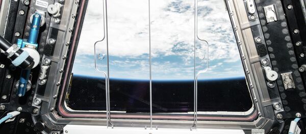 Vista de Tierra desde la cúpula de EEI - Sputnik Mundo