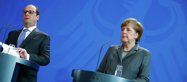 François Hollande, presidente de Francia y Angela Merkel, canciller de Alemania - Sputnik Mundo