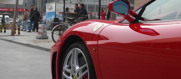 Ferrari en la calle de una de las ciudades chinas - Sputnik Mundo