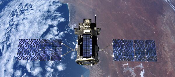 Un satélite en el espacio - Sputnik Mundo