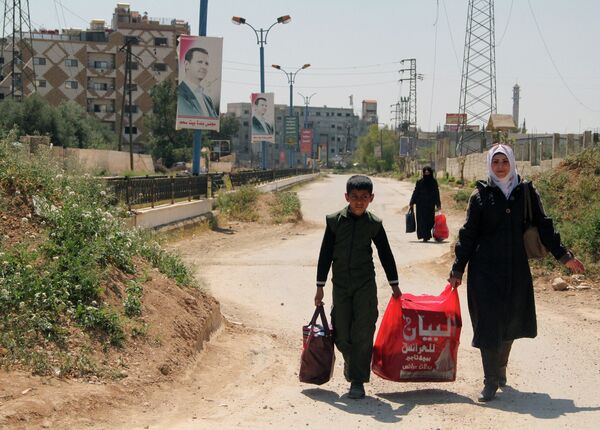 Situación en el campo de refugiados de Yarmuk en las afueras de Damasco - Sputnik Mundo