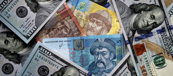 Dólares y grivnas Dólares y grivnas - Sputnik Mundo