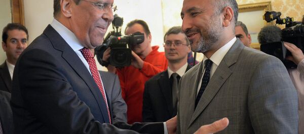 Ministro de Exteriores de Rusia, Serguéi Lavrov, y asesor de seguridad nacional del presidente de Afganistán, Hanif Atmar. Moscú, 15 de abril de 2015 - Sputnik Mundo