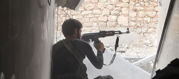 Un militante de la organización terrorista Estado Islámico (Archivo) - Sputnik Mundo