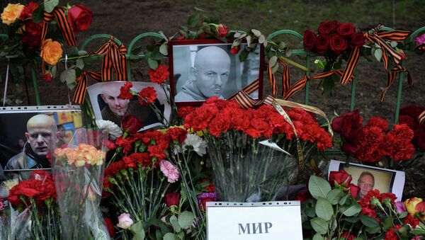 Homenaje al periodista Oles Buzina - Sputnik Mundo