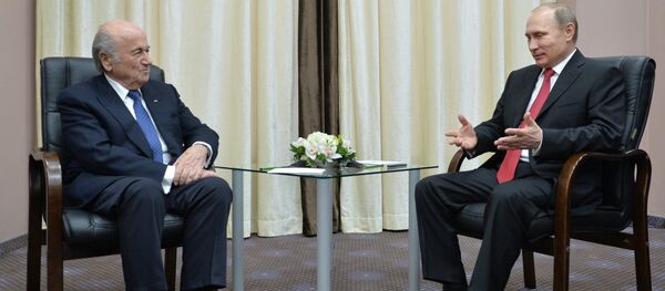 Presidente de la FIFA, Joseph Blatter y presidente de Rusia, Vladímir Putin - Sputnik Mundo