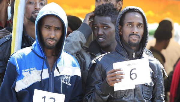 Migrantes en Italia - Sputnik Mundo
