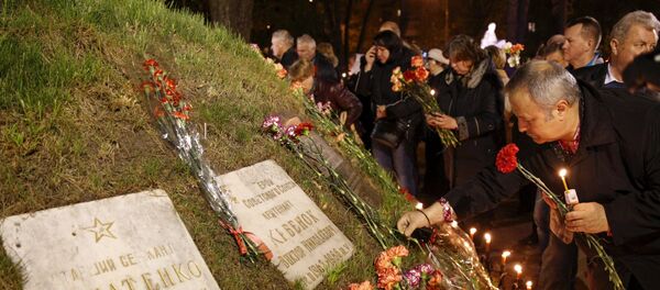 Homenaje a las víctimas de la catástrofe de Chernóbil en Kiev - Sputnik Mundo