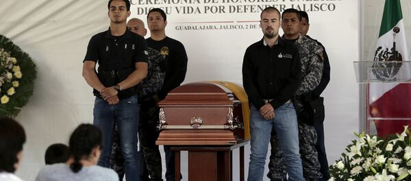 Se eleva a 15 muertos balance de ola de violencia en Jalisco, centro de México - Sputnik Mundo