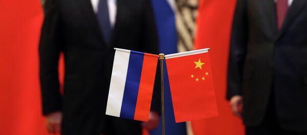 Presidente de Rusia, Vladímir Putin, y presidente de China, Xi Jinping - Sputnik Mundo