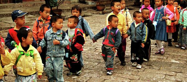 El primer ministro chino pide más protección a los “niños dejados atrás” - Sputnik Mundo