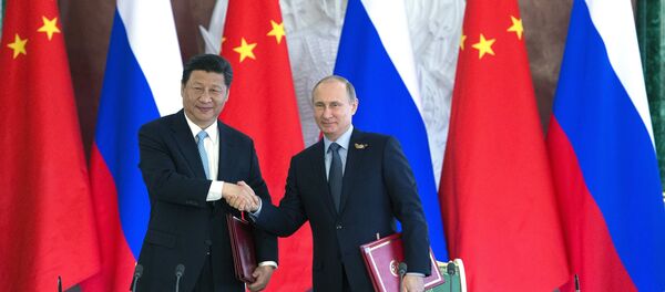 Presidente de China, Xi Jinping y presidente de Rusia, Vladímir Putin - Sputnik Mundo