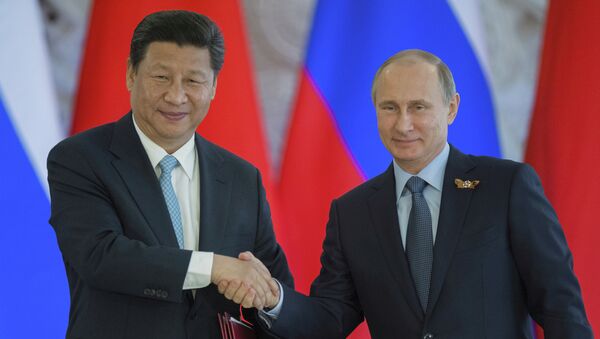 Presidente de China, Xi Jinping y presidente de Rusia, Vladímir Putin - Sputnik Mundo