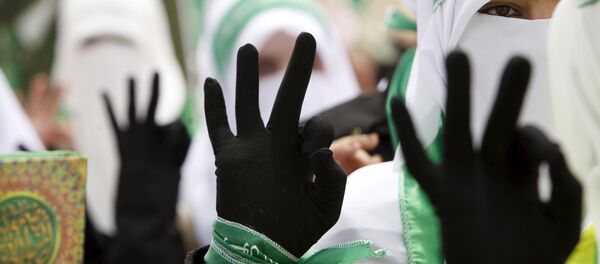 Estudiantes palestinos, simpatizantes del grupo islámico Hamás - Sputnik Mundo