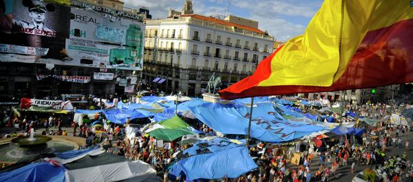 Campamento de los 'indignados' en la Puerta del Sol de Madrid. Mayo de 2011 - Sputnik Mundo