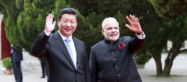 Presidente de China, Xi Jinping, y primer ministro de India, Narendra Modi - Sputnik Mundo