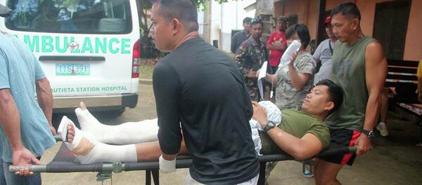 Soldado filipino herido después del enfrentamiento con el grupo Abu Sayyaf (archivo) Soldado filipino herido después del enfrentamiento con el grupo Abu Sayyaf (archivo) - Sputnik Mundo