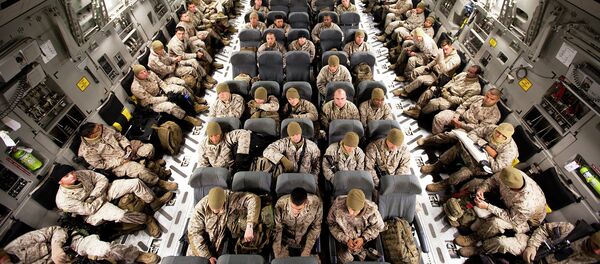 Soldados estadounidenses en su camino a Afganistán Soldados estadounidenses en su camino a Afganistán - Sputnik Mundo