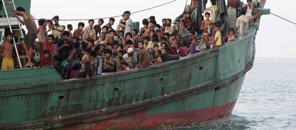 Los cancilleres de Indonesia, Malasia y Tailandia abordan el problema de migrantes - Sputnik Mundo