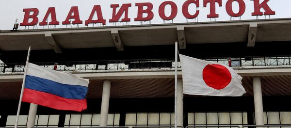 Banderas de Rusia y Japón - Sputnik Mundo