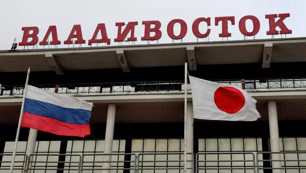 Banderas de Rusia y Japón - Sputnik Mundo