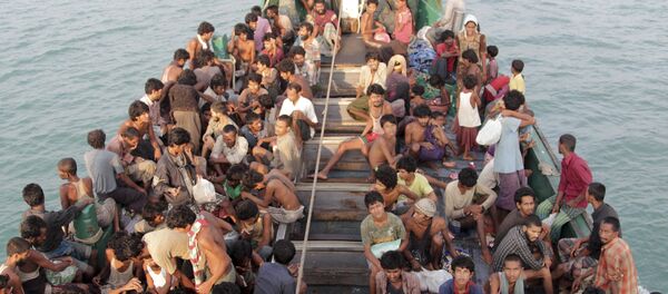 El primer ministro malasio ordena rescatar a migrantes ilegales - Sputnik Mundo