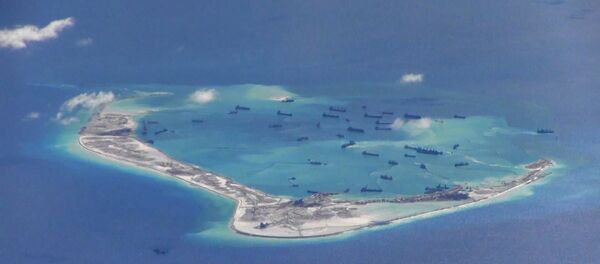 Buques chinos en las aguas disputadas del mar del Sur de China (archivo) Buques chinos en las aguas disputadas del mar del Sur de China (archivo) - Sputnik Mundo