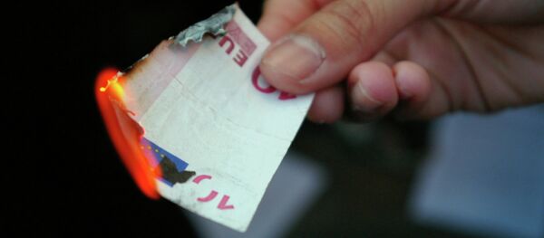 Dinero quemado - Sputnik Mundo