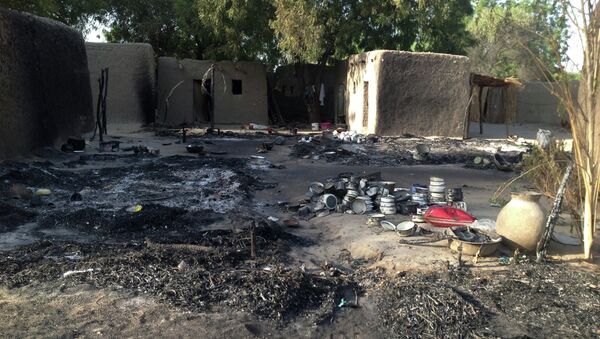 Un pueblo atacado por Boko Haram, Nigeria (archivo) Un pueblo atacado por Boko Haram, Nigeria (archivo) - Sputnik Mundo