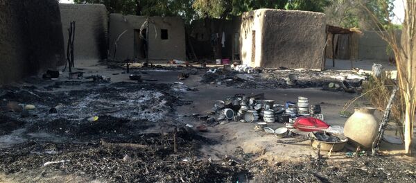 Un pueblo atacado por Boko Haram, Nigeria (archivo) - Sputnik Mundo