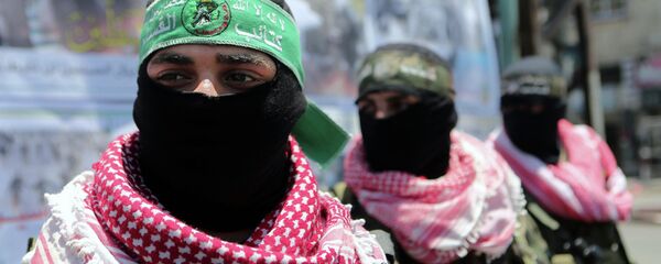Militantes de las Brigadas de Ezzeldin Al-Qassam, brazo armado de Hamás - Sputnik Mundo
