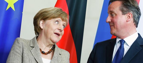 Canciller de Alemania, Angela Merkel y primer ministro de Reino Unido, David Cameron - Sputnik Mundo