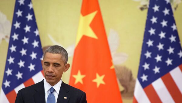 U.S. President Barack Obama attends a joint news conference with Chinese President Xi Jinping at the Great Hall of the People in Beijing - Sputnik Mundo