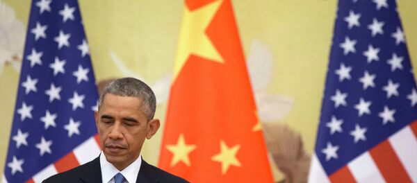 U.S. President Barack Obama attends a joint news conference with Chinese President Xi Jinping at the Great Hall of the People in Beijing - Sputnik Mundo
