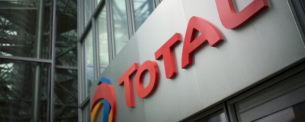 Logo de Total - Sputnik Mundo