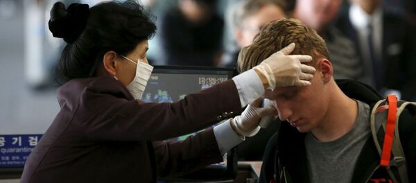 Control de pasajeros en el aeropuerto de Incheon, Korea del Sur, el 2 de junio, 2015 - Sputnik Mundo
