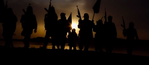 Militantes del grupo Daesh - Sputnik Mundo