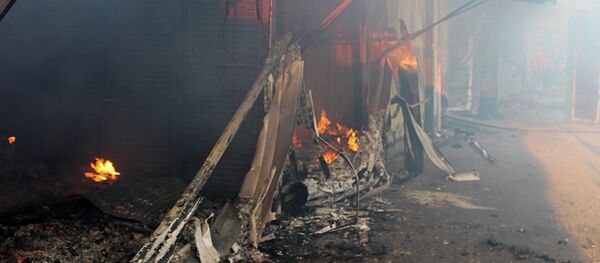 Bombardeos en el poblado de la mina Oktiábrskaia, en Donetsk Bombardeos en el poblado de la mina Oktiábrskaia, en Donetsk - Sputnik Mundo