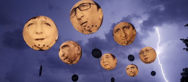 Globos con rostros de los líderes del G7 Globos con rostros de los líderes del G7 - Sputnik Mundo