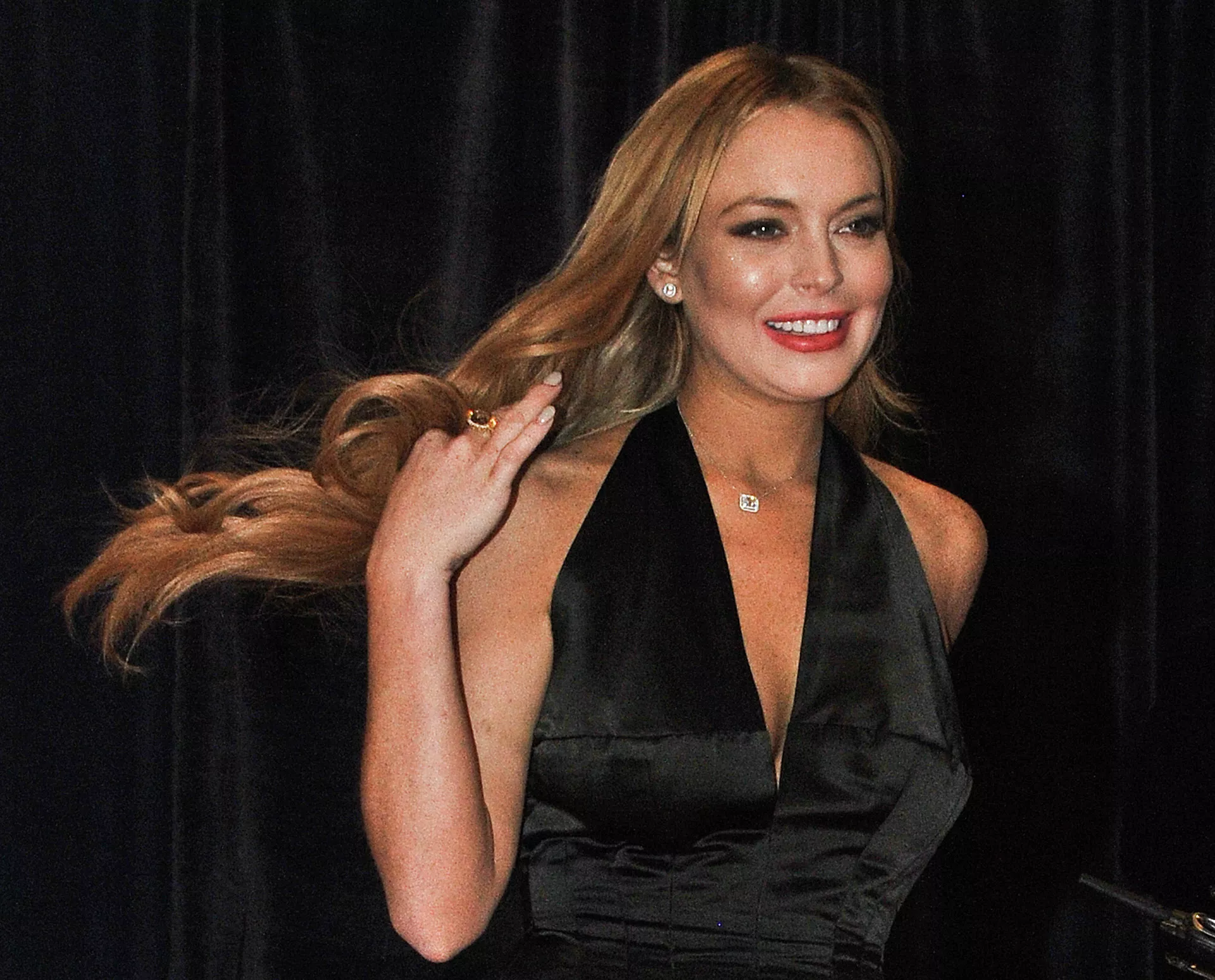 US actress Lindsay Lohan arrive at the annual White House Correspondents' Association dinner in Washington on April 28, 2012. US actress Lindsay Lohan arrive at the annual White House Correspondents' Association dinner in Washington on April 28, 2012. - Sputnik Mundo, 1920, 24.02.2021